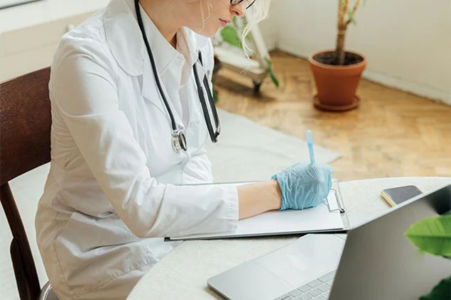 doctor writing something