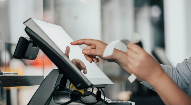person working on pos system