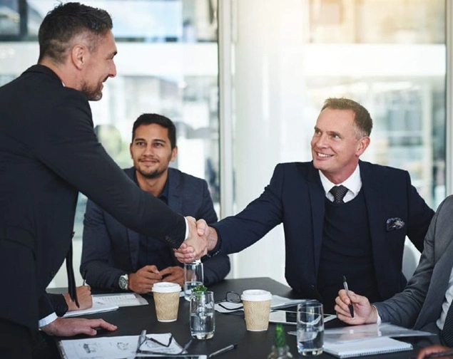 Business meeting handshake