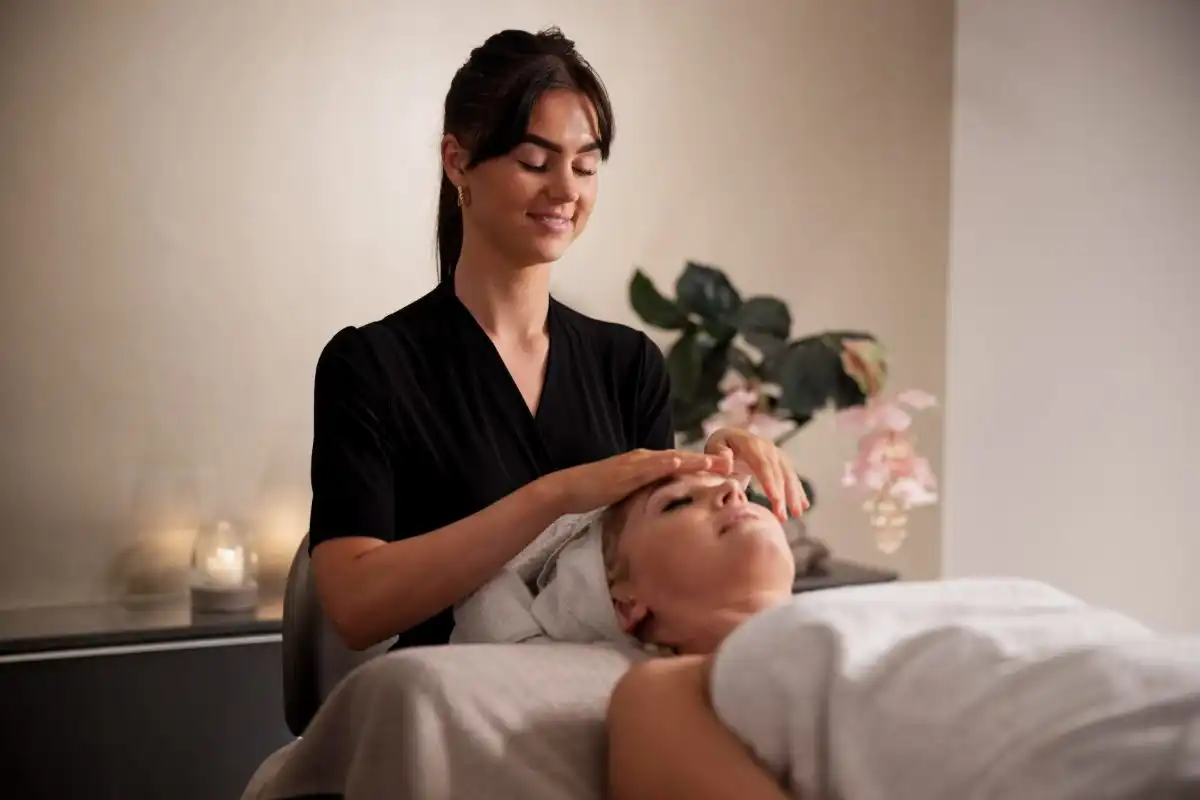 Esthetician giving a facial
